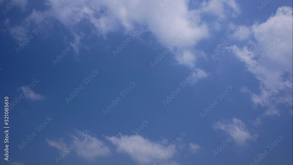 Cloudy with blue sky on sunny day timelapse