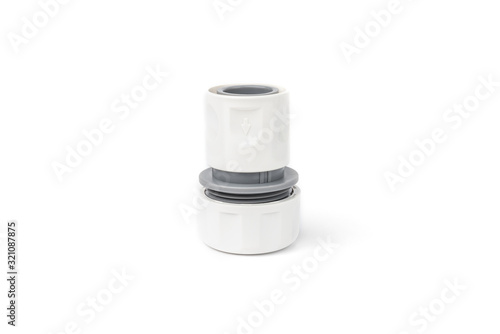 White garden water hose connector isolated on white background.