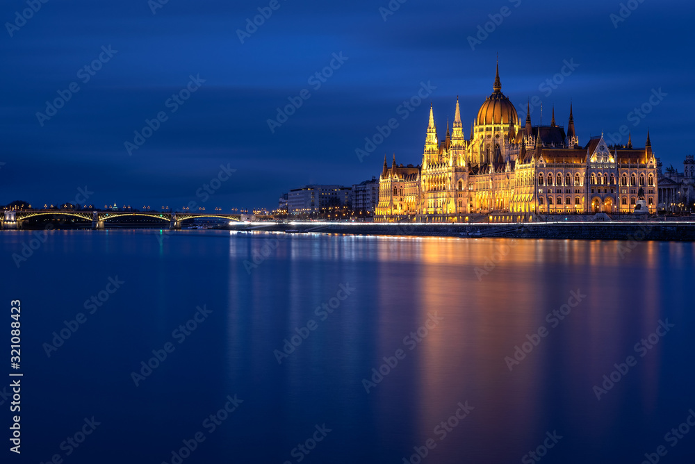 Hungarian Parliament Building in Budapest at night with Danube river