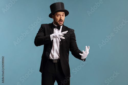 Obraz na płótnie Magician performing a trick with hands