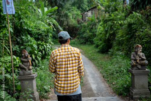 Tour guide on the jungle trail in Ubud, Bali, Indonesia