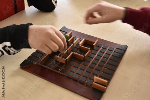 a board game and playing hand