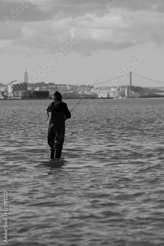 Fisherman Fishing alone in Tagus River, Black and White