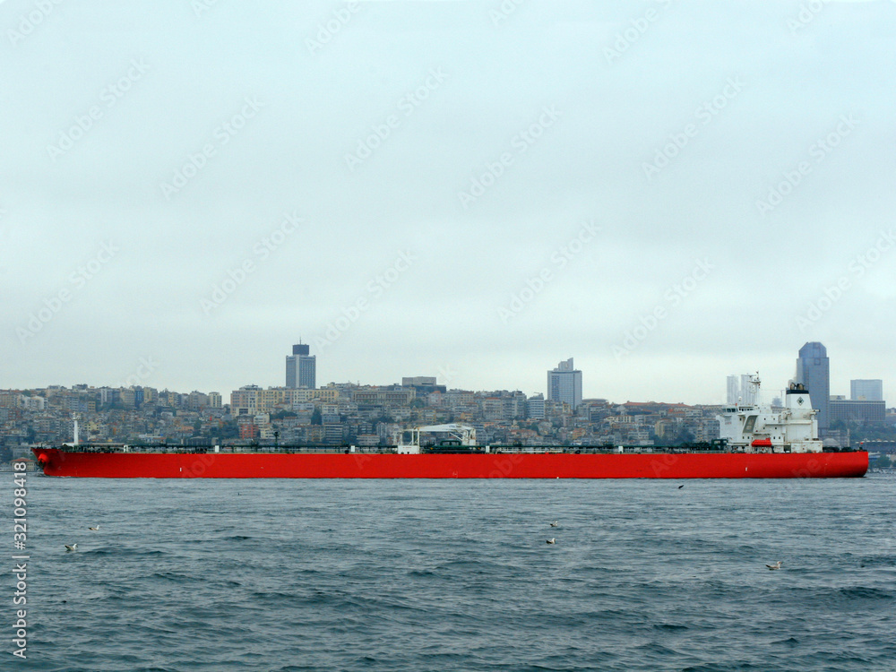 Obraz premium A large barge floating near Egypt coast