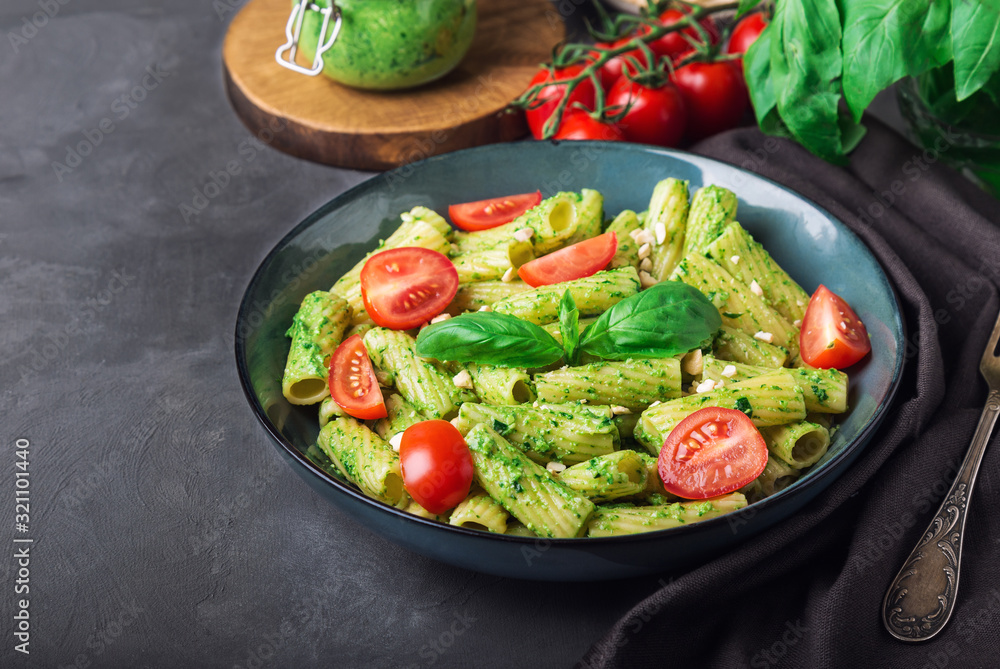Homemade tortiglioni pasta with vegan pesto sauce Homemade tortiglioni pasta with vegan pesto sauce