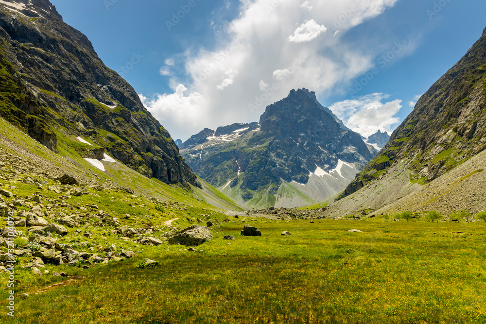 Panoramic mountain views in the French Alps in the summer. Panoramic mountain views in the French Alps in the summer.