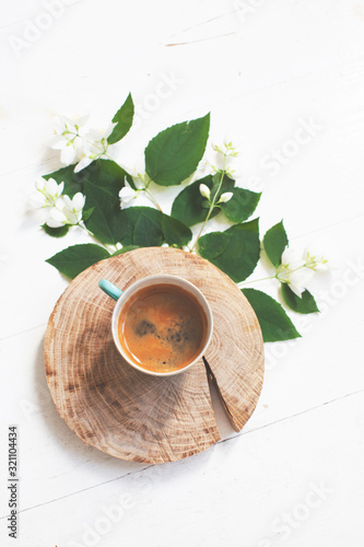 coffee with mint leaves on wooden background with copy space for your text. morning concept