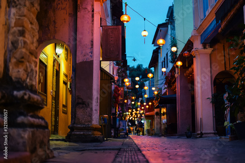 Canvas Print Urban landscape of an asian city called Ipoh at sunset