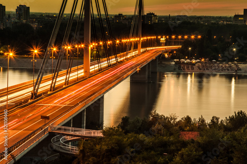 Valokuva Liberty bridge over river Danube, sunset in Novi Sad town