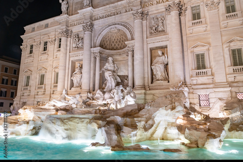 Fountain di Trevi by night - most famous Rome's fountains in the world. Italy.