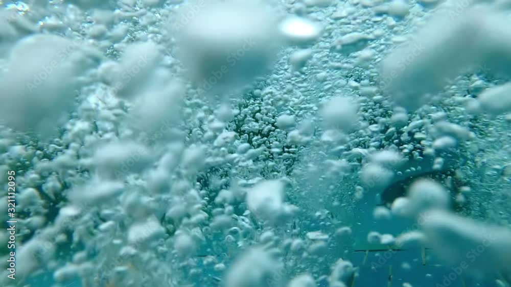 Dreamy POV looking on feet in bubble pool underwater Dreamy POV looking on feet in bubble pool underwater