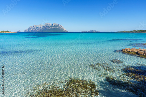 Clear water of sardinian beachs with view on Tavolara island © Emiliano