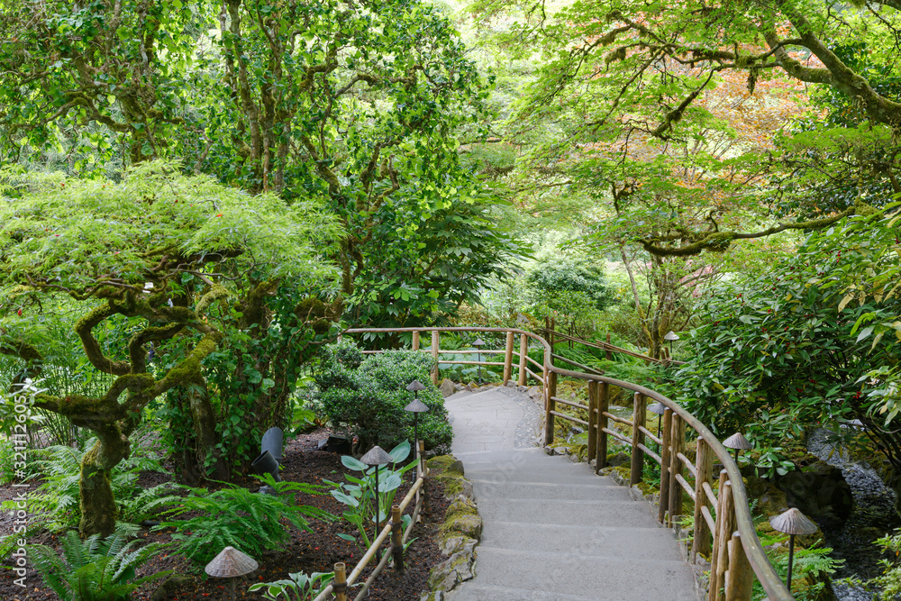 Ecological path in the Butchart gardens in summer. Victoria, British Columbia, Canada. Ecological path in the Butchart gardens in summer. Victoria, British Columbia, Canada.