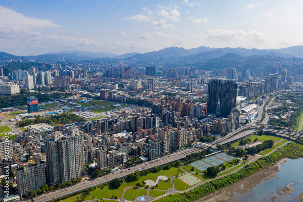 Aerial sunny view of the Xindian District cityscape