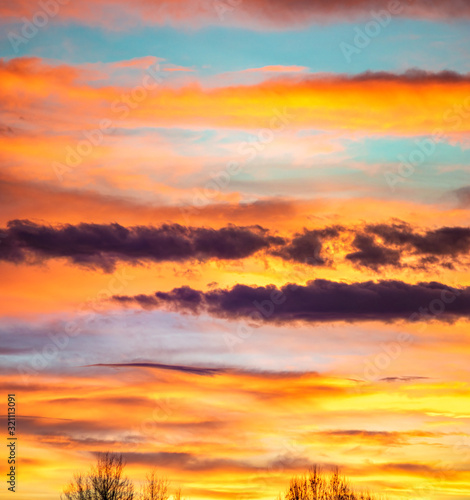 Panorama of colorful x clouds in the sunset sky © onyx124