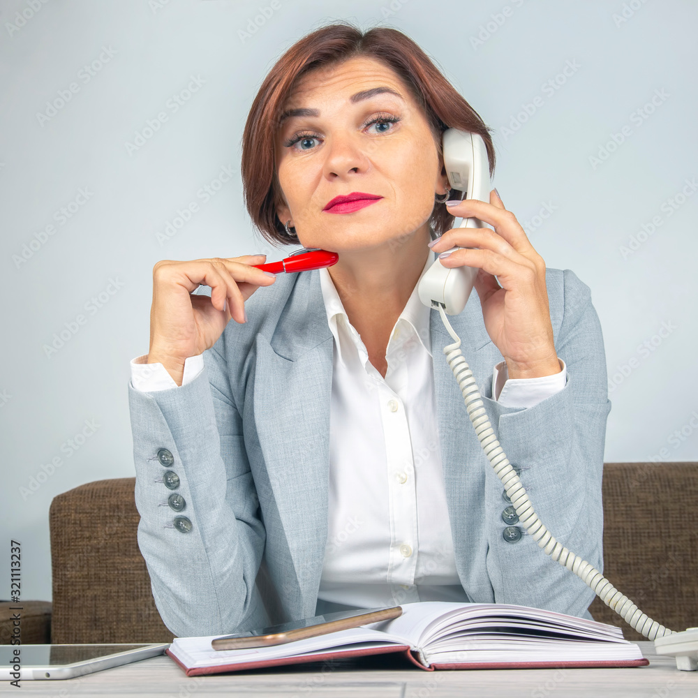 Business woman at work in the office. business qualities and career growth Business woman at work in the office. business qualities and career growth