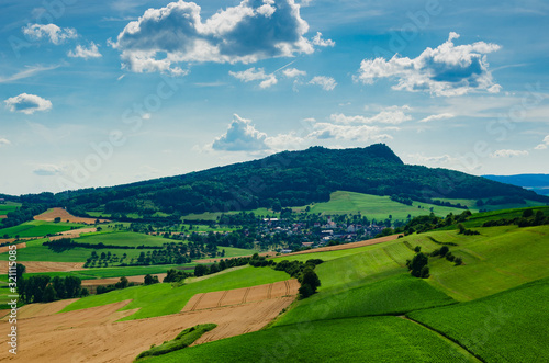 Panorama Hegau. landscape with green hills and blue sky photo
