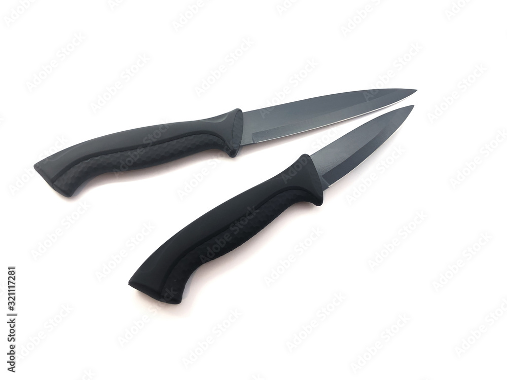 Obraz premium Knife composition isolated on a white background. Set of black matte knives. Paring knife and utility knife. Sharp blade.