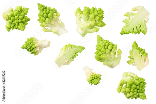 sliced romanesco broccoli isolated on white background. Roman cauliflower. top view photo