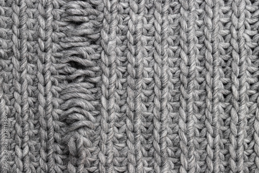 Light grey knitting texture with manufacturing defect isolated on white Light grey knitting texture with manufacturing defect isolated on white