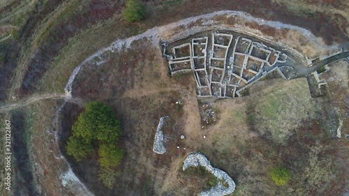 Top down pull up footage of Castro de Castromaior, ancient ruins of Celtic settlement in the Lugo municipality, North west Spain. photo