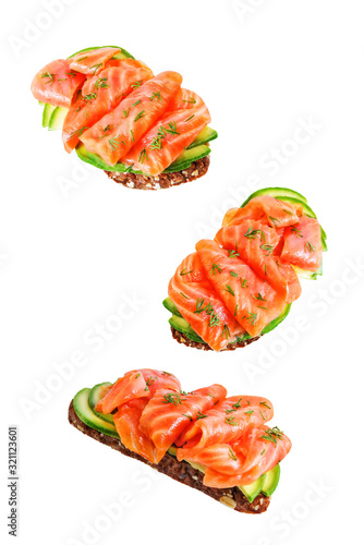 Smoked salmon avocado rye sandwich on a white isolated background