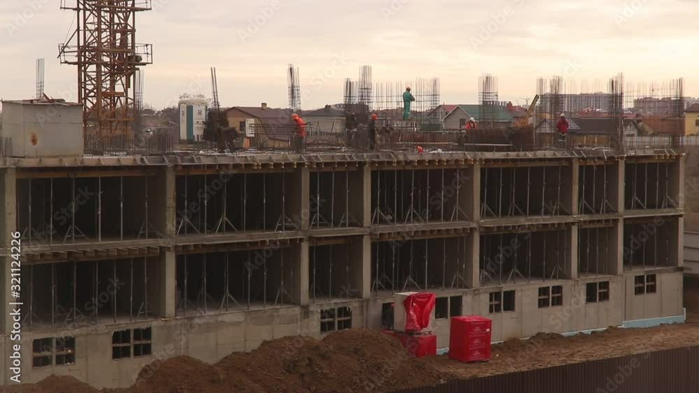 time-lapse many builders are building a skyscraper time-lapse many builders are building a skyscraper
