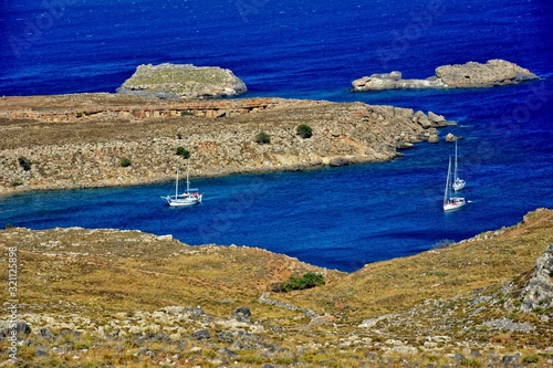 summer landscape of the Greek island of Rhodes with blue cloudless sky and sea