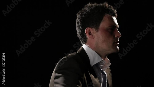 CU, Lockdown, Bruised businessman turning from side to front