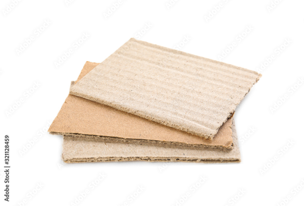 Pieces of brown cardboard isolated on white Pieces of brown cardboard isolated on white