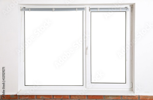 Modern window with blinds in empty room