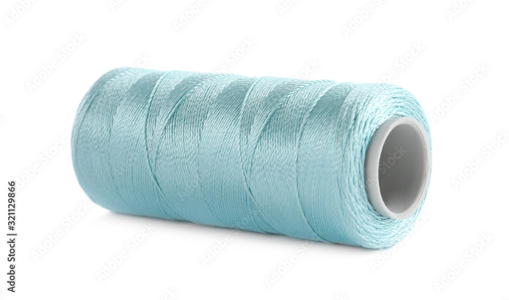 Spool of light blue sewing thread isolated on white Spool of light blue sewing thread isolated on white