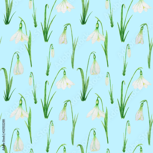 Seamless pattern with Snowdrop spring easter flowers with green leafs. Delicate Snowdrops. Fabric texture Hand painted Watercolor illustration on light blue background. Spring simbols concept.
