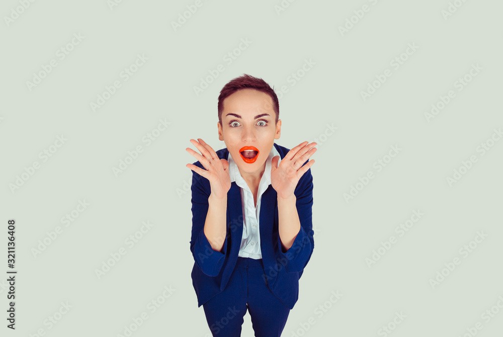 Wow. Close up portrait young woman beautiful girl with short hair looking excited holding her mouth opened, hands near face isolated light green wall. Shocked surprised stunned. Positive human emotion Wow. Close up portrait young woman beautiful girl with short hair looking excited holding her mouth opened, hands near face isolated light green wall. Shocked surprised stunned. Positive human emotion
