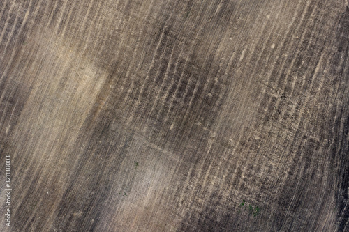 Aerial top down view of agriculture field in springtime