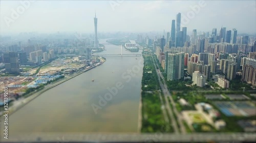 day time guangzhou city pearl river downtown part aerial panorama tilt-shift 4k china photo