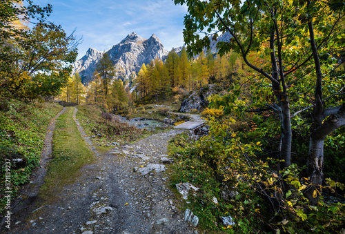 Autumn alpine stream view from mountain hiking path to Tappenkarsee, Kleinarl, Land Salzburg, Austria.