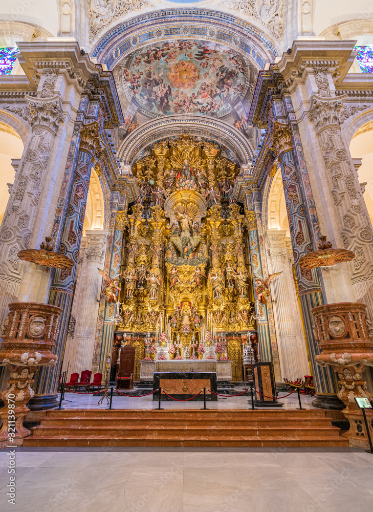 Finely decorated altar in the Divino Salvador Church in Seville. Andalusia, Spain.