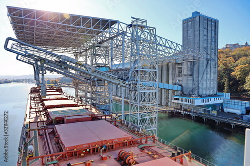 Cargo terminal for loading grain cargo by shore cranes. Port Tacoma,WA, USA. October, 2019.