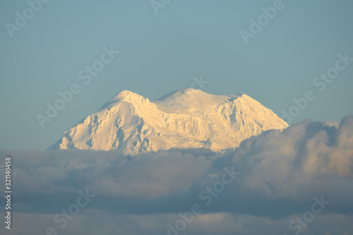 Snowy Mountain In The Clouds As Seen From Tumwater, Washington