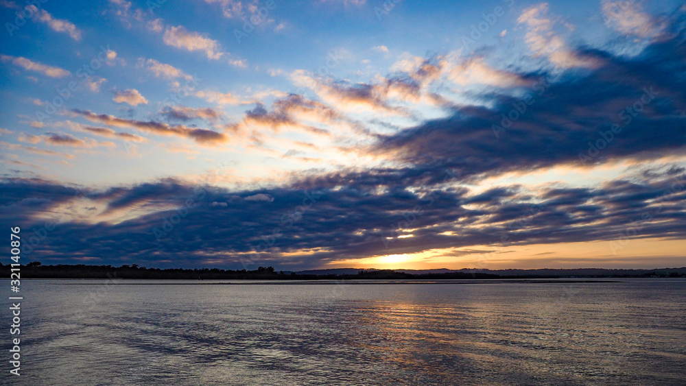 Obraz premium Sunset over River