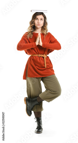 Beautiful meditating young ...