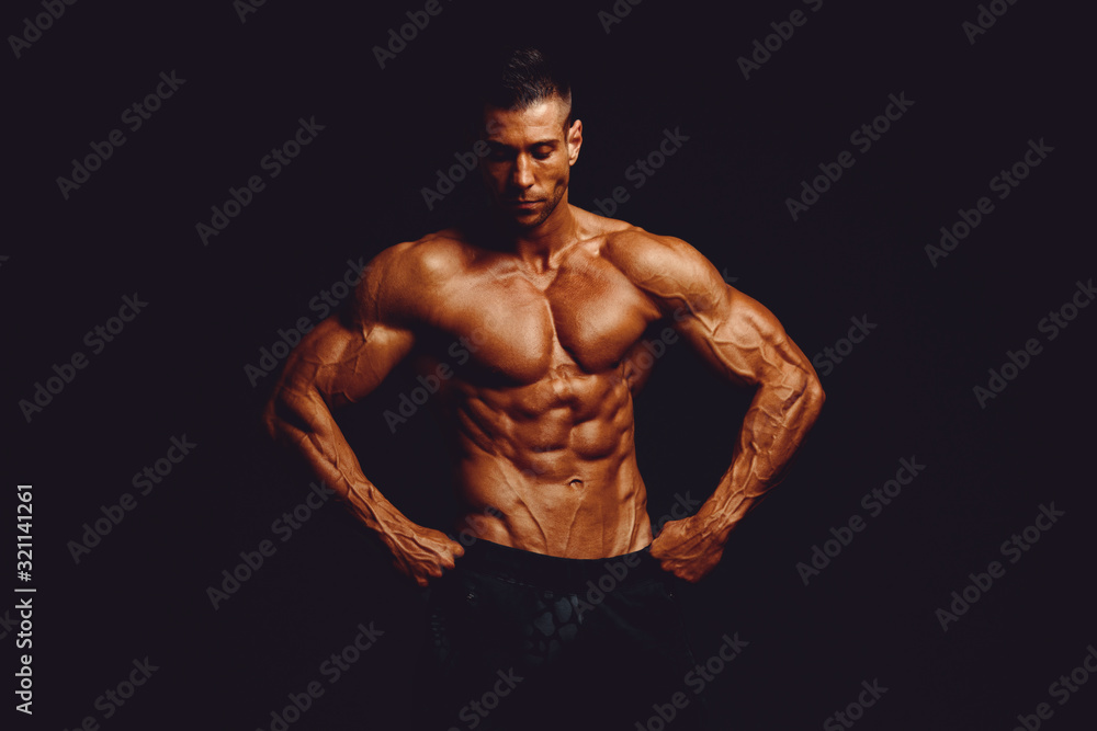 Strong Muscular Men Posing and Flexing Muscles Strong Muscular Men Posing and Flexing Muscles