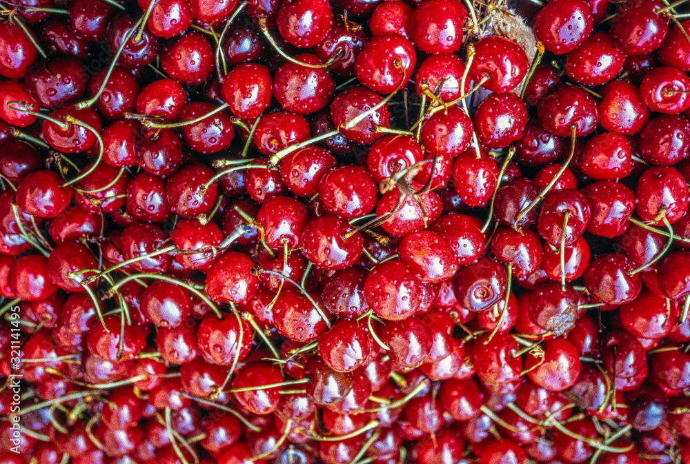 Φωτογραφία cherry is the fruit of many plants of the genus Prunus, and is a fleshy drupe ,s