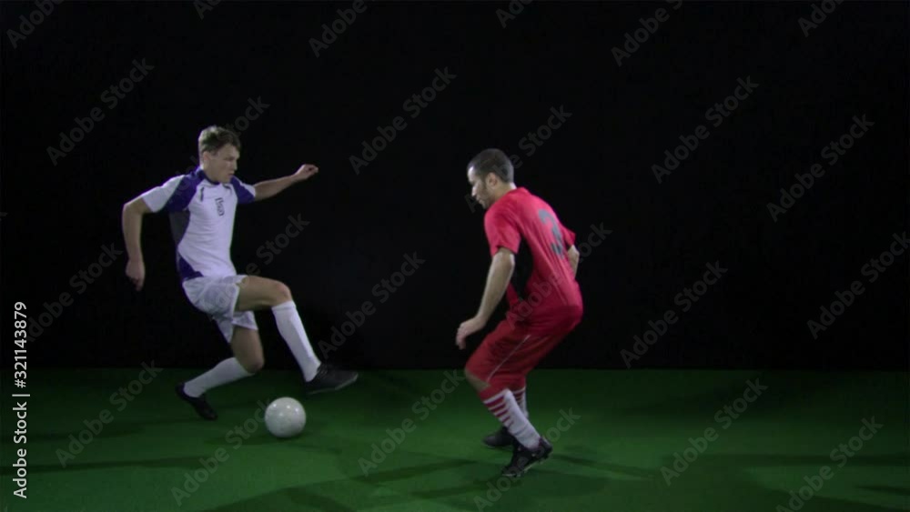 SLO MO, WS, Lockdown, two soccer players playing against each other SLO MO, WS, Lockdown, two soccer players playing against each other