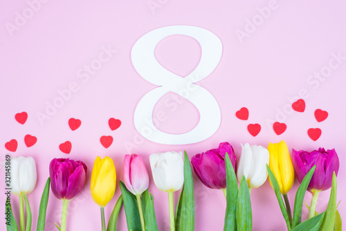 8 March congrats concept. Above high angle closeup view photo of beautiful white number eight multi colored spring flowers isolated pastel background