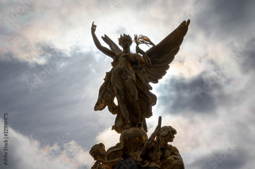Fotografie, Obraz Nike Goddess of Victory Statue on the Victoria Monument Memorial outside Bucking