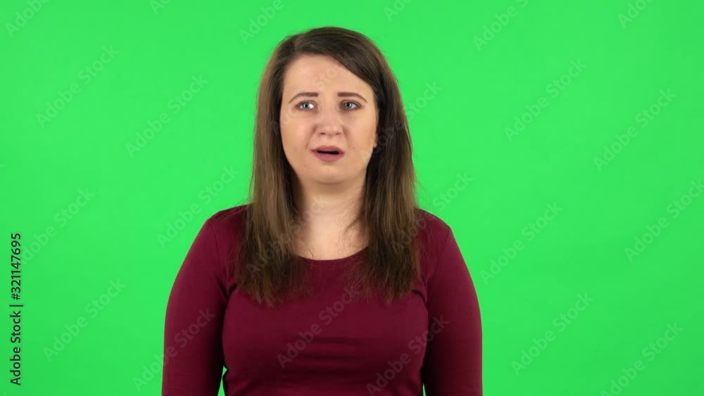 Portrait of frightened girl says wow with shocked facial expression. Green screen Portrait of frightened girl says wow with shocked facial expression. Green screen