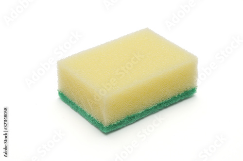 Sponge for washing dishes and plumbing on a white background