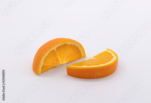 Orange Fruit Slice On White Background